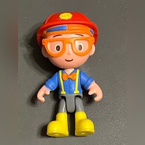 Kids Toy Figure with Orange Glasses and Yellow Boots